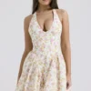 Valentia Mini-Halter-Kleider aus Baumwolle mit „Ivory Meadow“-Print Valentia Mini-Halter-Kleider aus Baumwolle mit „Ivory Meadow“-Print