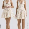 Valentia Mini-Halter-Kleider aus Baumwolle mit „Ivory Meadow“-Print Valentia Mini-Halter-Kleider aus Baumwolle mit „Ivory Meadow“-Print