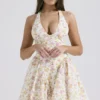 Valentia Mini-Halter-Kleider aus Baumwolle mit „Ivory Meadow“-Print Valentia Mini-Halter-Kleider aus Baumwolle mit „Ivory Meadow“-Print