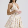Valentia Mini-Halter-Kleider aus Baumwolle mit „Ivory Meadow“-Print Valentia Mini-Halter-Kleider aus Baumwolle mit „Ivory Meadow“-Print