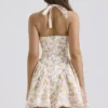 Valentia Mini-Halter-Kleider aus Baumwolle mit „Ivory Meadow“-Print Valentia Mini-Halter-Kleider aus Baumwolle mit „Ivory Meadow“-Print