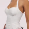 Zizi Weißes Neckholder-Oberteil mit Broderie Anglaise Zizi Weißes Neckholder-Oberteil mit Broderie Anglaise