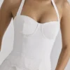 Zizi Weißes Neckholder-Oberteil mit Broderie Anglaise Zizi Weißes Neckholder-Oberteil mit Broderie Anglaise